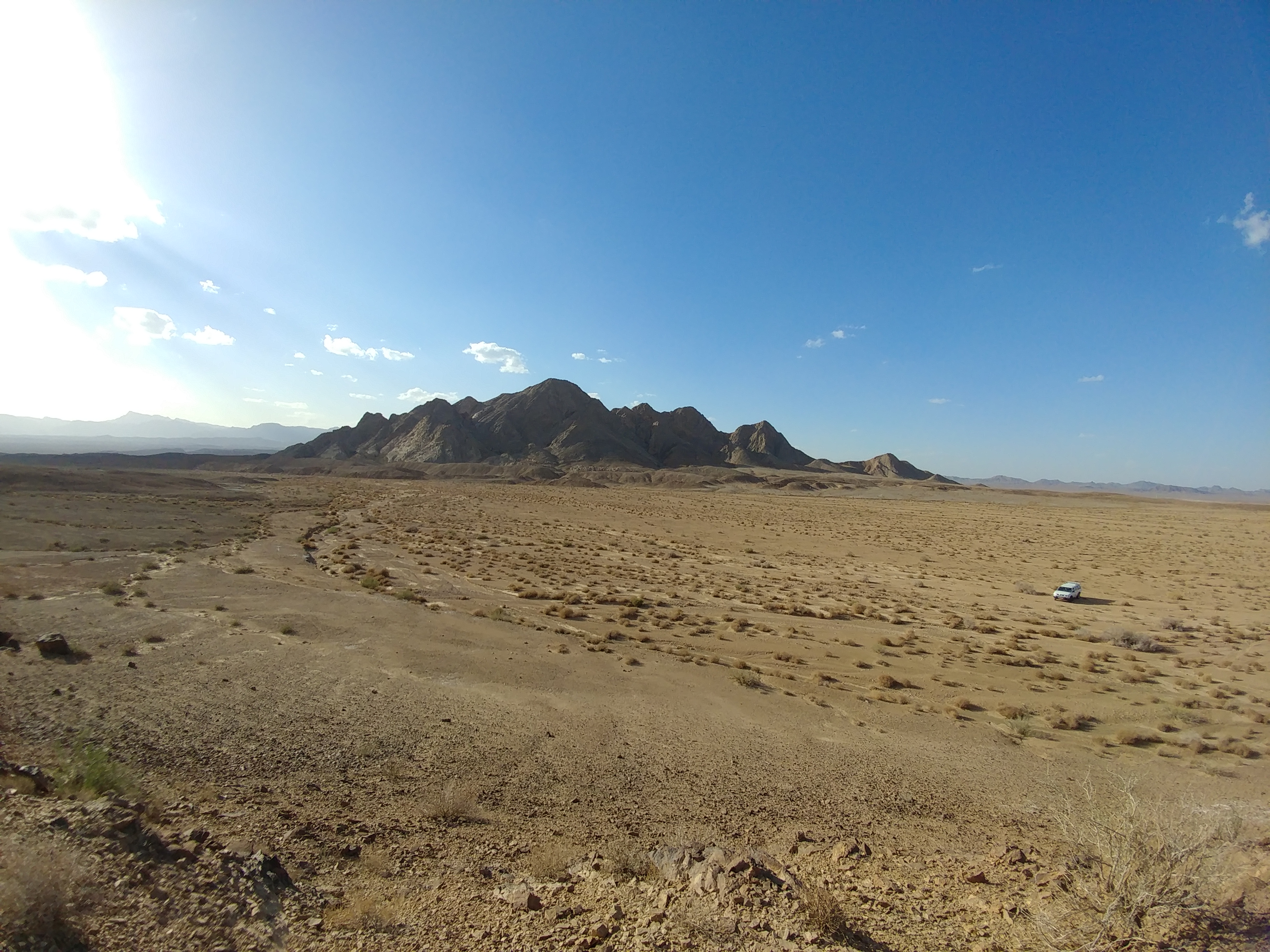 Vast desert with a mountain in the middle